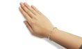 Load image into Gallery viewer, 10K Yellow and White Gold 1.00 Cttw Round-Cut and Baguette-Cut Diamond Floral S-Link 7" Bracelet (I-J Color, I1-I2 Clarity)