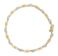 Load image into Gallery viewer, 10K Yellow and White Gold 1.00 Cttw Round-Cut and Baguette-Cut Diamond Floral S-Link 7" Bracelet (I-J Color, I1-I2 Clarity)
