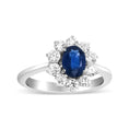 Load image into Gallery viewer, 18K White Gold 7x5 mm Oval Cut Blue Sapphire and Round Diamond 3/4 Cttw Sunburst Halo Ring (F-G Color, VS1-VS2 Clarity)
